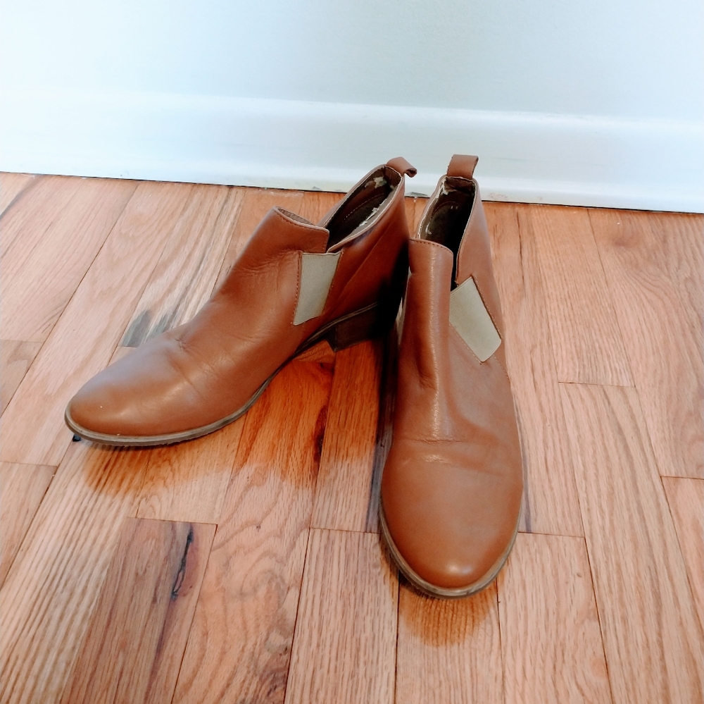 Tory Burch leather brown ankle boots with small heel.  Some wear on the heels an